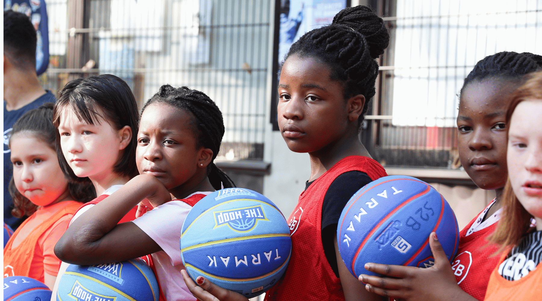 Young female basketball players taking part in the free sports activities organised by Sport2Be
